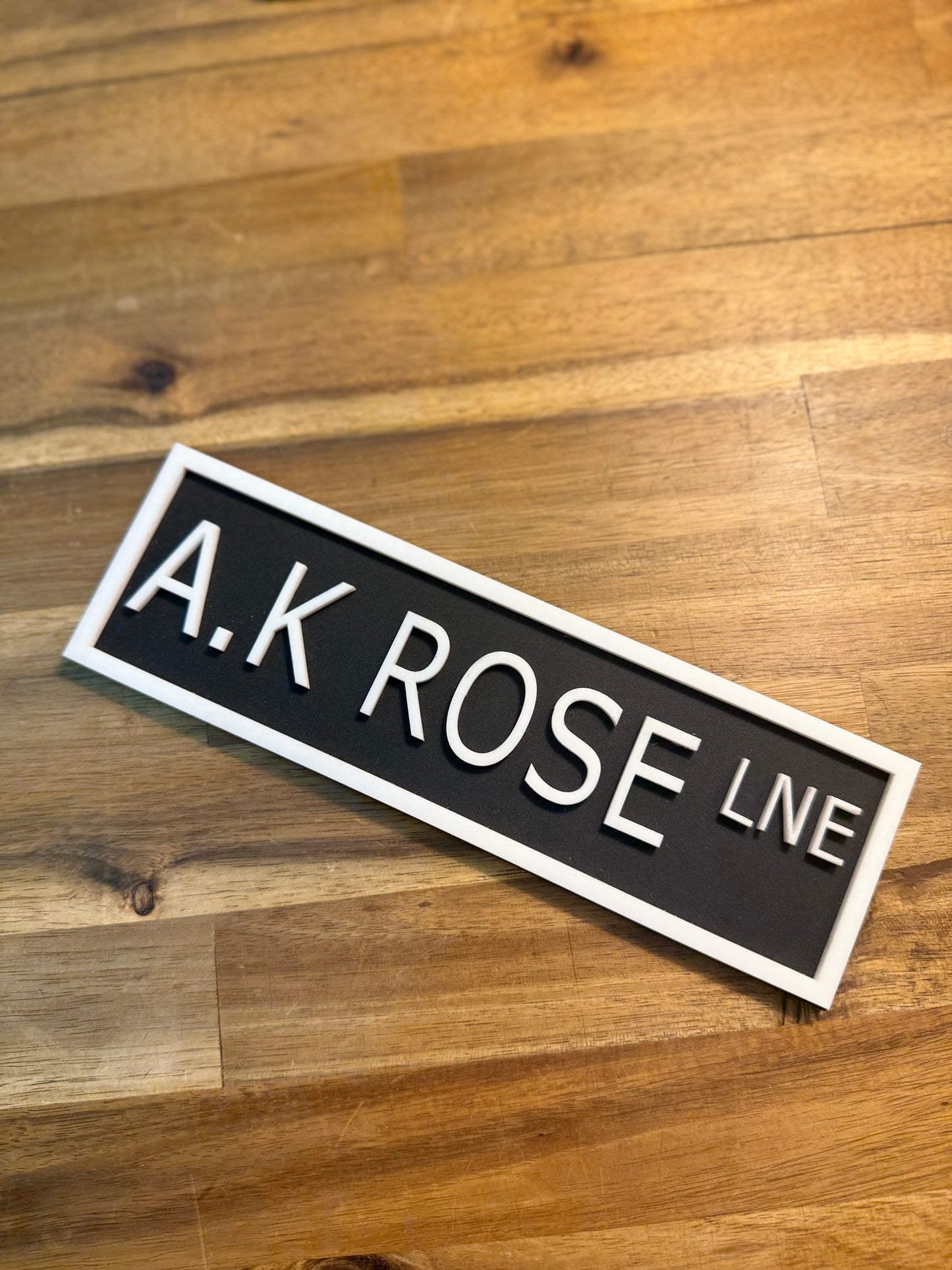 Bookshelf Sign - A.K Rose Lne