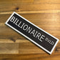 Bookshelf Sign - Billionaire Bvld